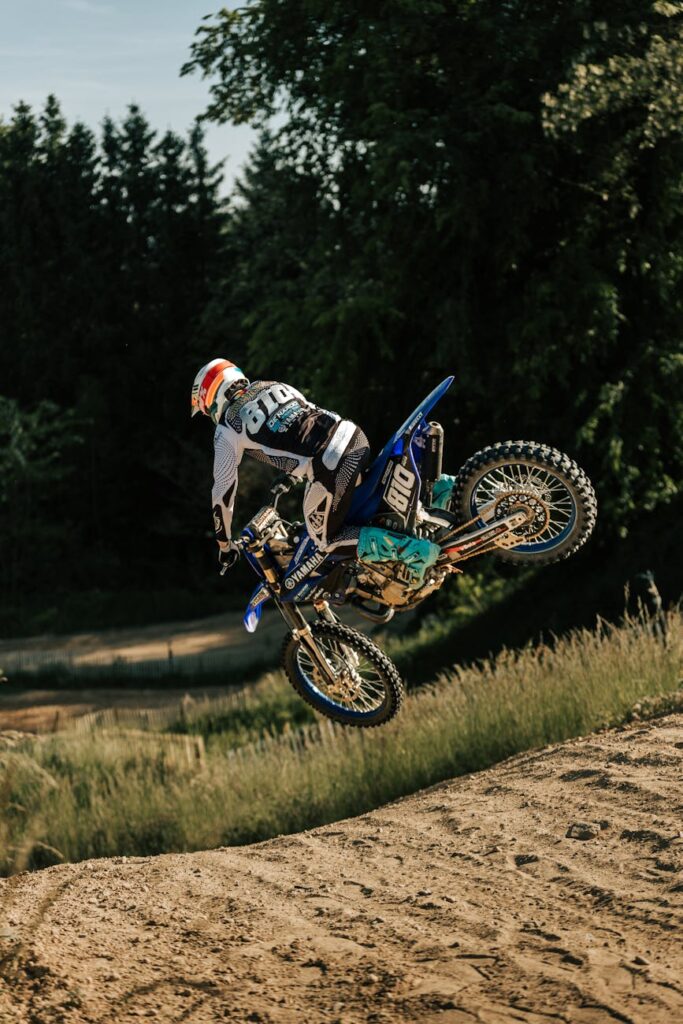 dynamic motocross jump on a dirt track
