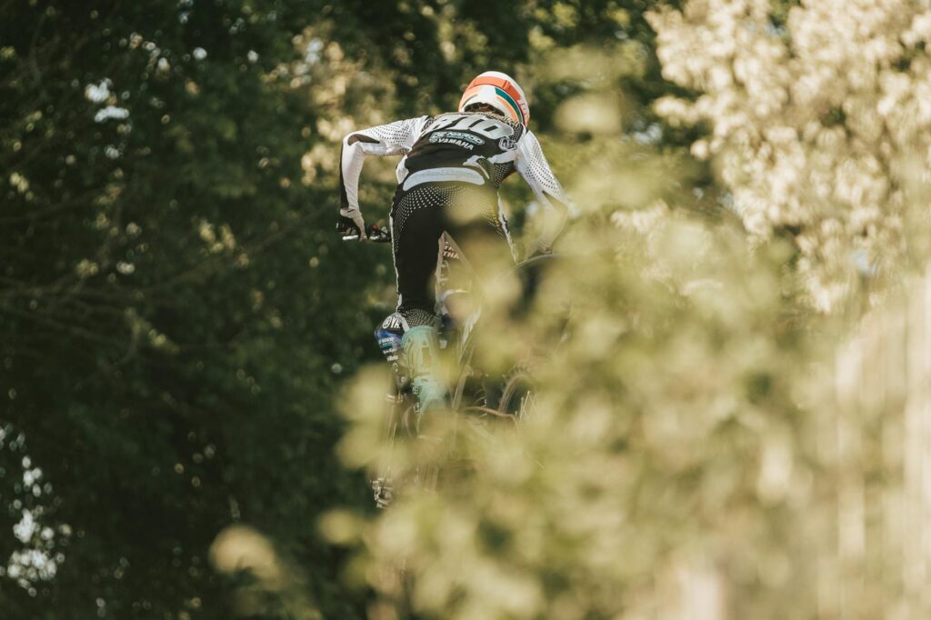 motocross rider jumping in outdoor race